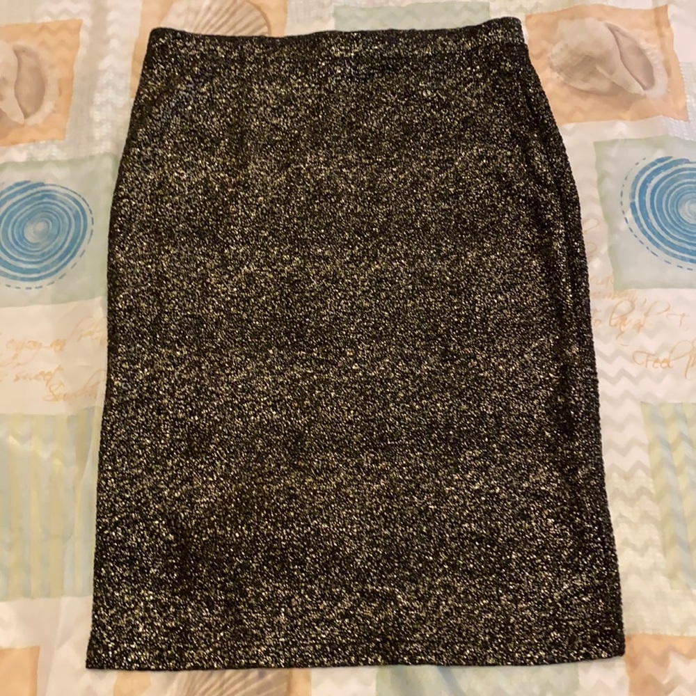 Women’s slip on black with shiny silver coloring M skirt. Love Blossom Brand